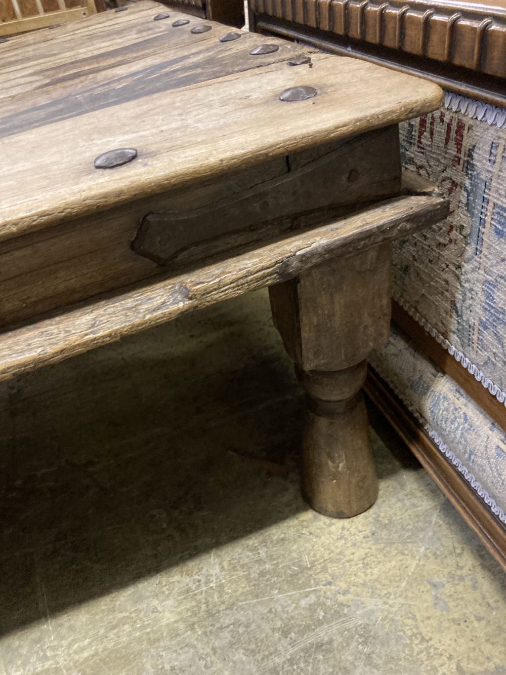 An Indonesian studded hardwood rectangular coffee table, width 180cm depth 98cm height 48cm